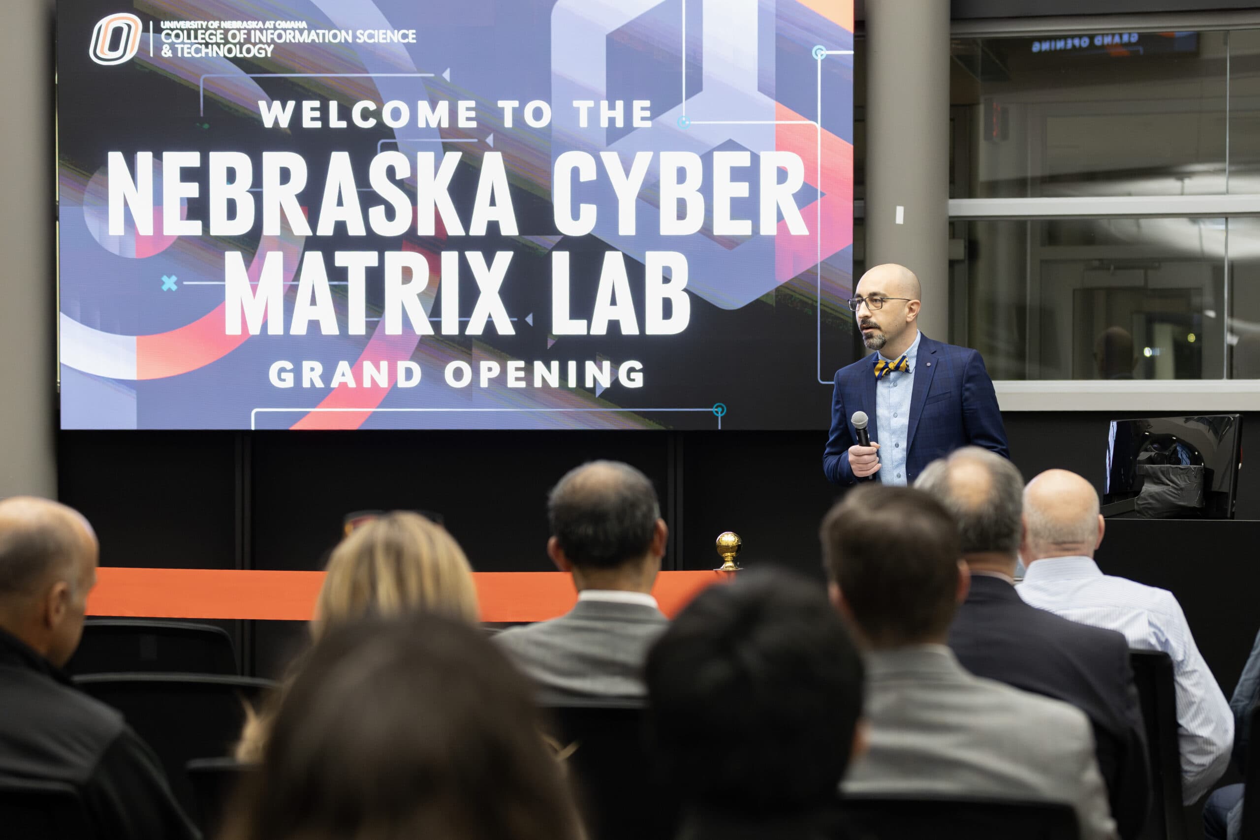 Matt Hale speaks during the NebraskaCYBER MATRIX grand opening